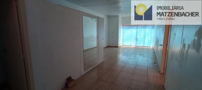 Espaço comercial anexo